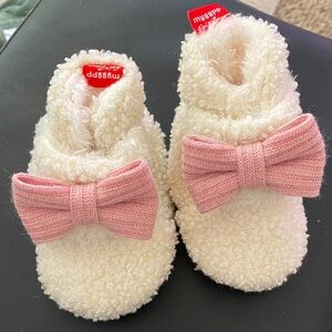 Cozy Cream Baby Booties with Pink Bow